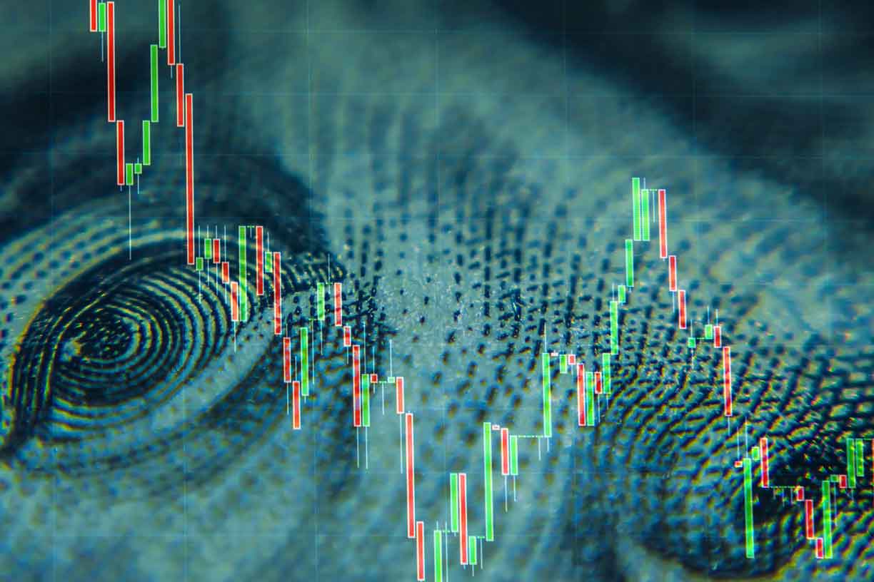 Close up view of currency with digital chart overlay