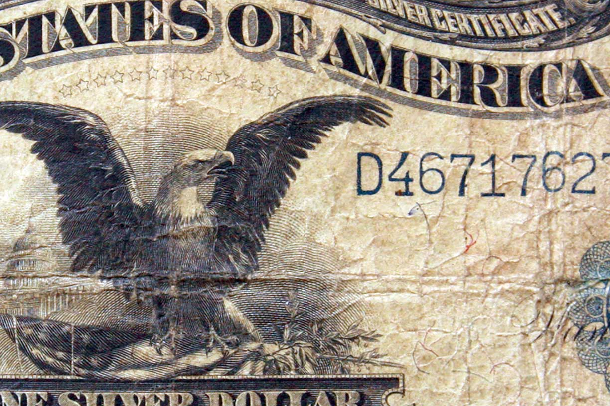 close-up of old us silver dollar 