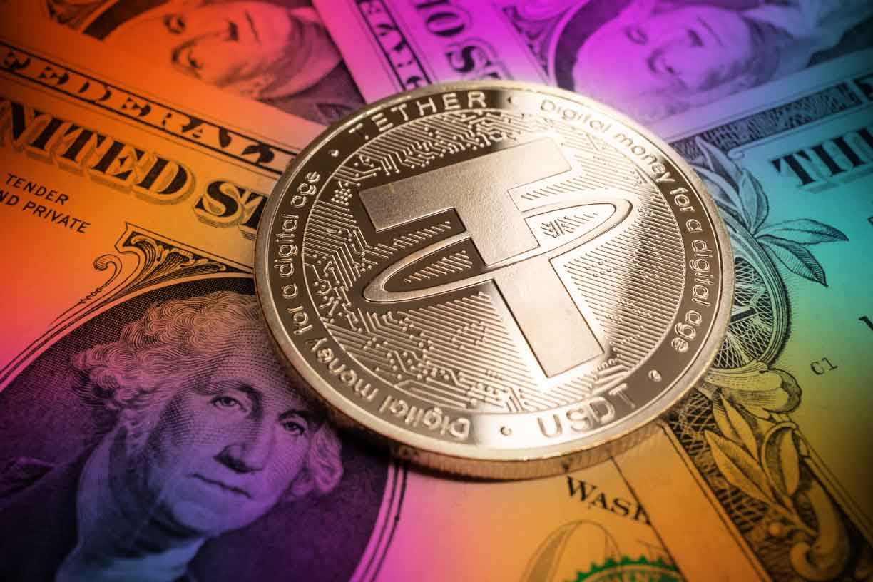 Tether coin on US dollar banknotes